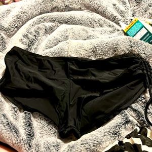 Black bikini bottoms with draw strings on both sides